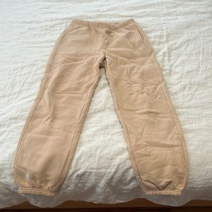 Champion sweat pants, color tan, size small, never worn